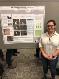 Student presents poster at AAG conference