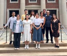 Students from Nanjing Normal University pose in front of LeFrak building