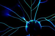 Blue sphere with network of light radiating outward